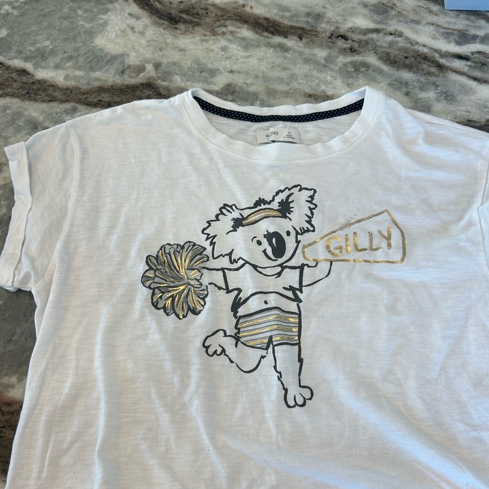 Gilly Hicks White Crop Top with Koala size S has fading paint stains